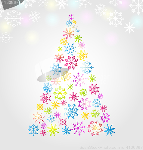 Image of Christmas pine made of colorful different snowflakes 