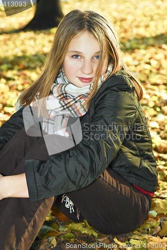 Image of Teenage girl in the fall