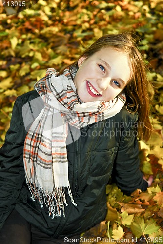 Image of Teenage girl in the fall