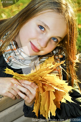 Image of Teenage girl in the fall