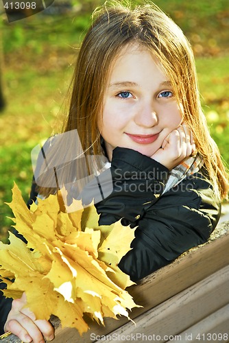 Image of Teenage girl in the fall