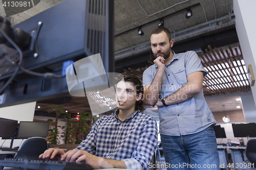 Image of startup business people group working as team to find solution