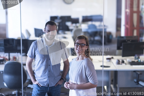 Image of business couple at office