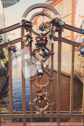 Image of locks on bridge in Prague to symbolize love forever