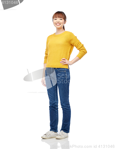 Image of happy asian young woman over white