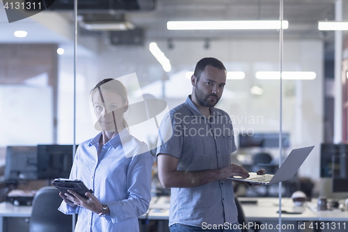 Image of business couple at office