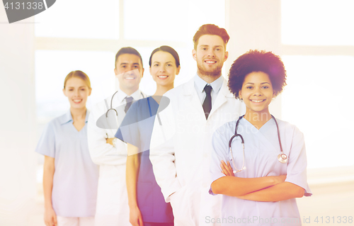 Image of group of happy doctors at hospital