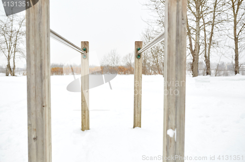 Image of parallel bars outdoors in winter