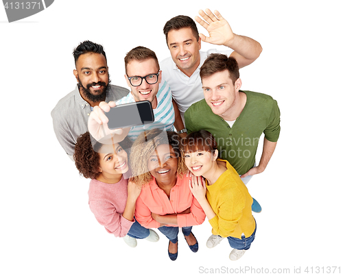 Image of group of people taking selfie by smartphone