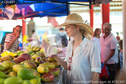 Image of Traveler shopping on traditional Victoria food market, Seychelles.