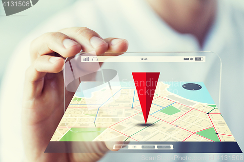 Image of close up of male hand showing smartphone and map