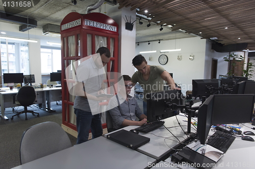 Image of startup business people group working as team to find solution