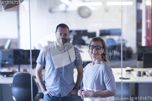 Image of business couple at office