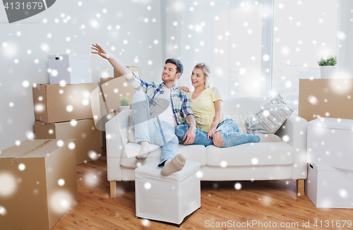 Image of couple with boxes moving to new home and dreaming