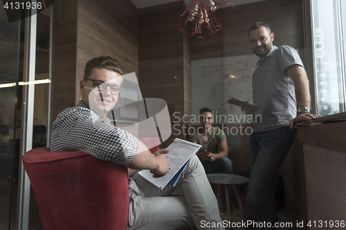 Image of team meeting and brainstorming in small private office