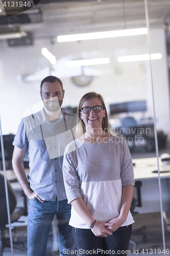 Image of business couple at office