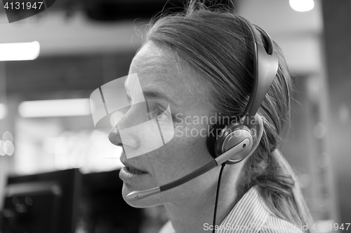 Image of female support phone operator