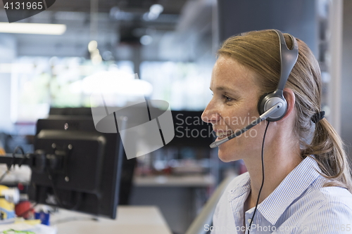 Image of female support phone operator