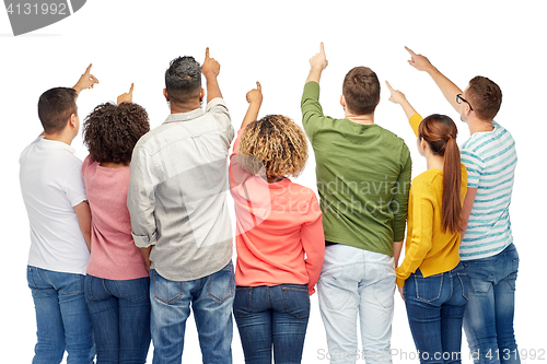 Image of group of people pointing to something