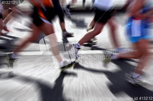 Image of Marathon runners - blurred motion