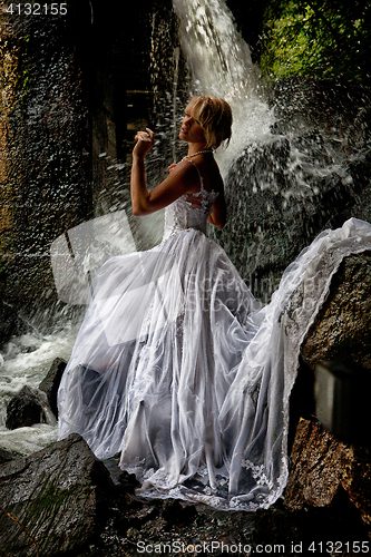 Image of Young Bride On A River