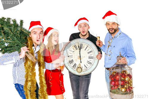 Image of Many young women and men drinking at christmas party