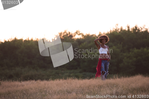 Image of young black woman in nature