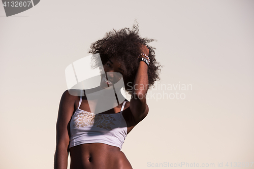 Image of young black woman in nature