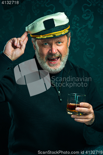 Image of Portrait of old captain or sailor man in black sweater