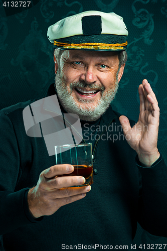 Image of Portrait of old captain or sailor man in black sweater