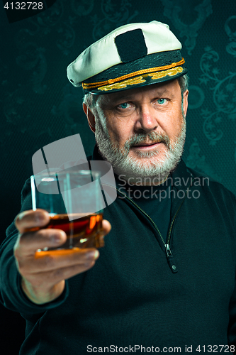 Image of Portrait of old captain or sailor man in black sweater