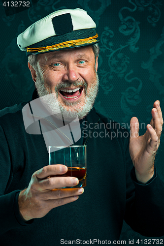 Image of Portrait of old captain or sailor man in black sweater