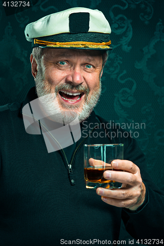 Image of Portrait of old captain or sailor man in black sweater