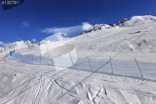 Image of Ski track in sun winter day