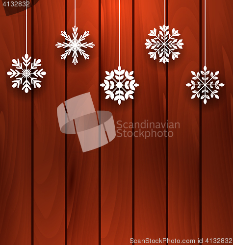 Image of Wooden Background with Variation Snowflakes