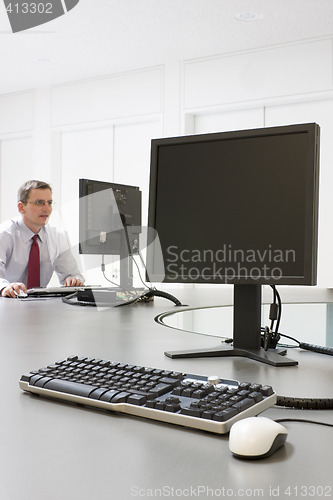 Image of Businessman working with computer