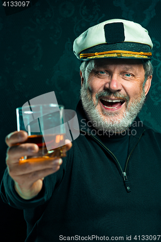 Image of Portrait of old captain or sailor man in black sweater