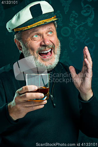 Image of Portrait of old captain or sailor man in black sweater