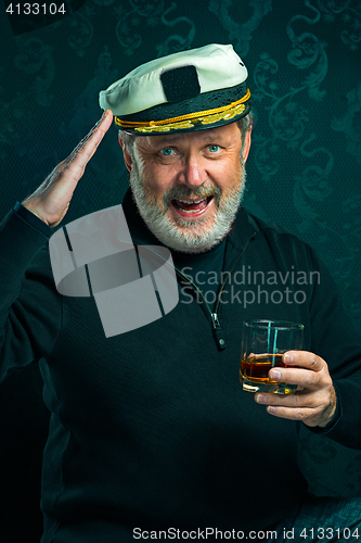 Image of Portrait of old captain or sailor man in black sweater
