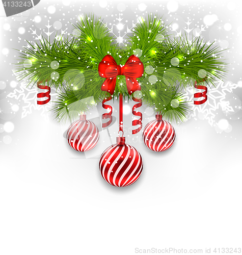 Image of Christmas glowing background with fir branches, glass balls, rib