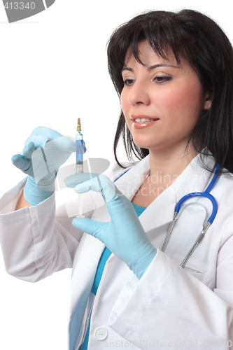Image of Female doctor preparing syringe