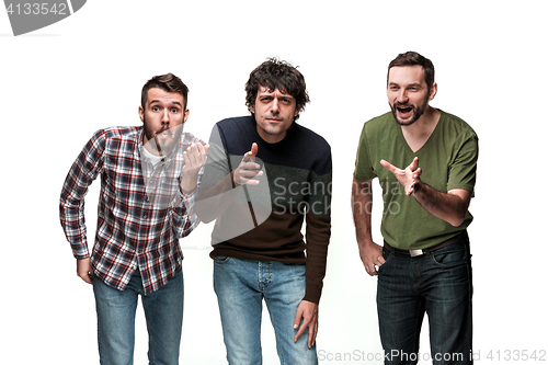 Image of The three men are smiling, looking at camera