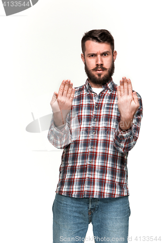 Image of Man is looking serious. Over white background