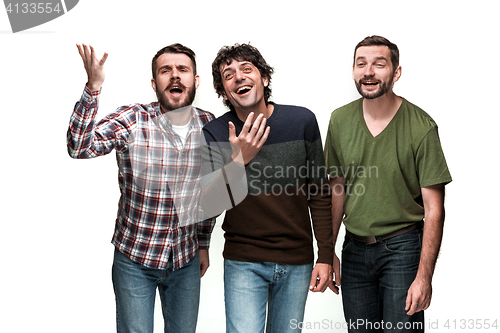 Image of The three men are smiling, looking at camera