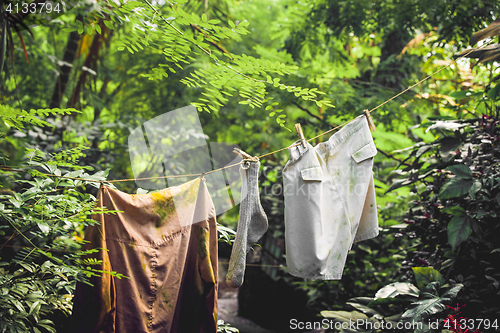 Image of Dirty laundry on a wire