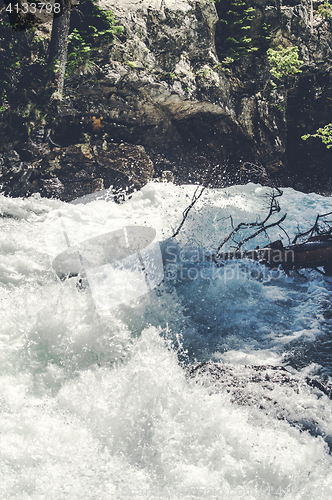 Image of Splashing water in a wild river stream