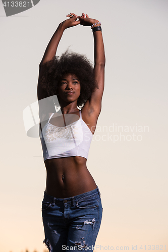 Image of young black woman in nature