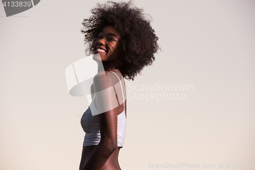 Image of young black woman in nature