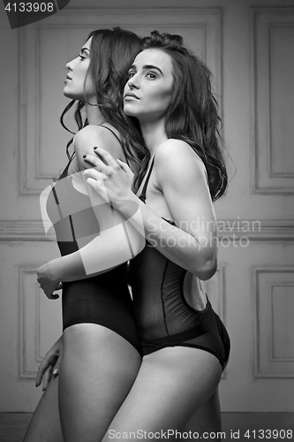 Image of Two beautiful women in black erotic lingerie