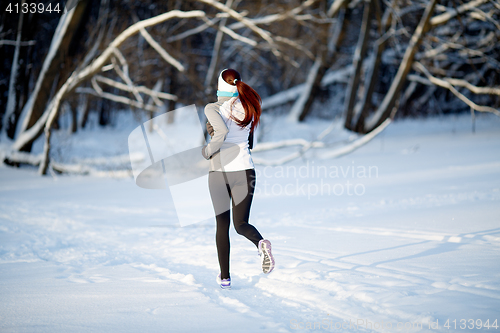 Image of Girl on jogging in winter